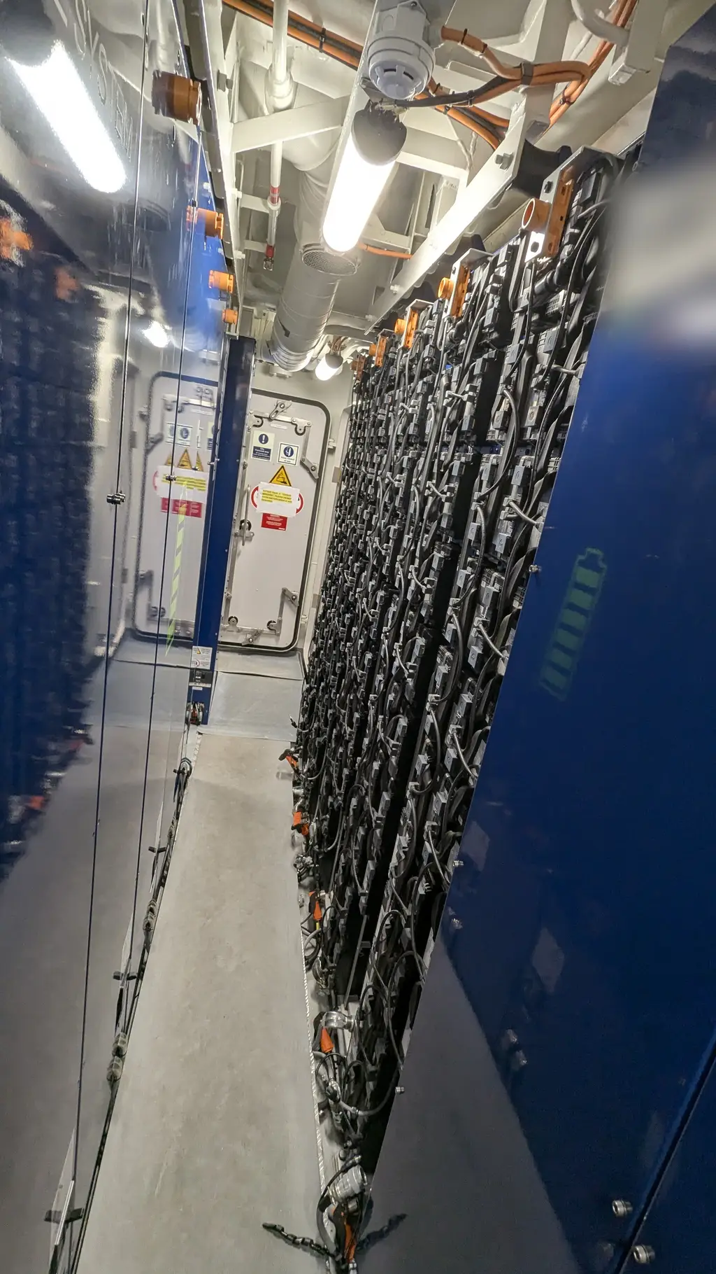 Corridor between the battery racks in a battery room